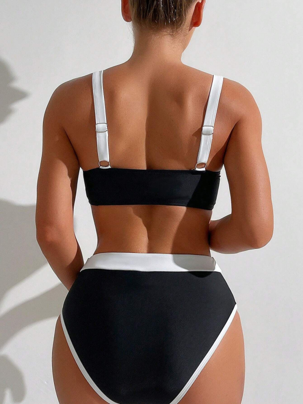 Dvostruki bikini s isprsnim jastučićima, bez leđa, uskog kroja; tkanina 82% poliester, podstava 18%