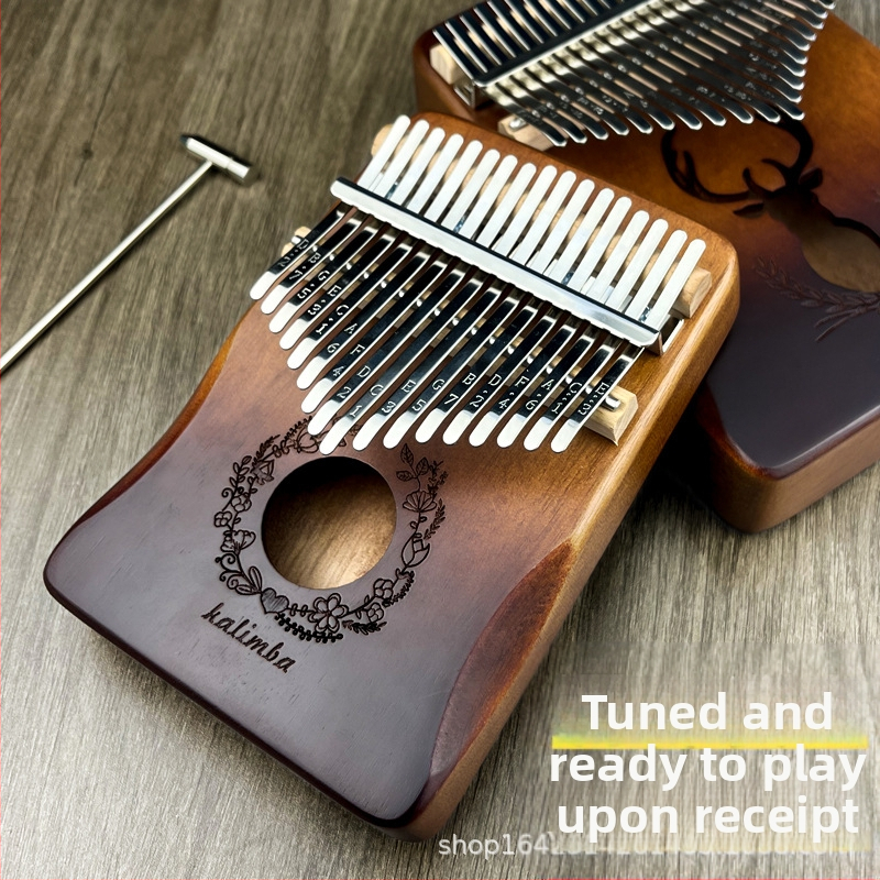 Drevená kalimba (prstové klavíro), 17 alebo 21 tónov, 21 otvorov, jadro z broskyňového dreva, tónina C
