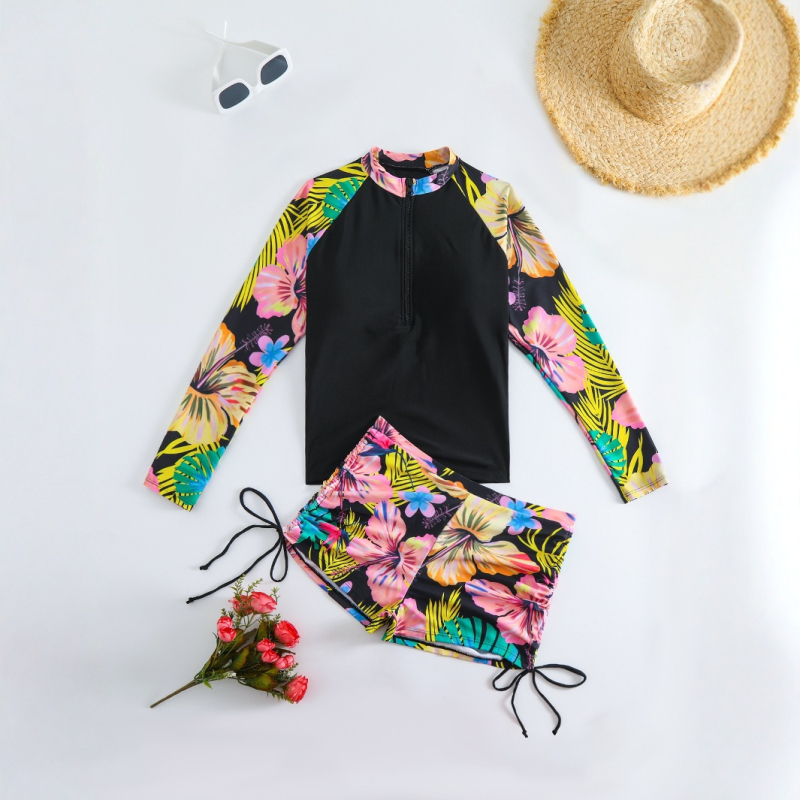 Hosszú ujjú napvédő fürdőruha virágmintával, mellpárnával, poliészter anyag és spandex bélés
