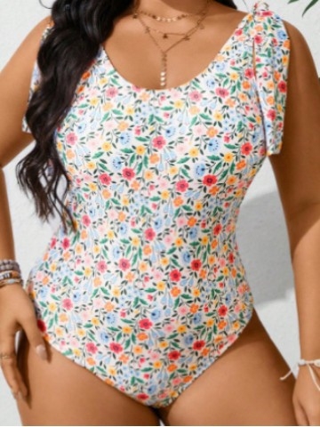 Egyrészes fürdőruha törött virágmintával, ujj nélküli, melltartóbetéttel, merevítők nélkül, 82% poliészter / 18% elasztán