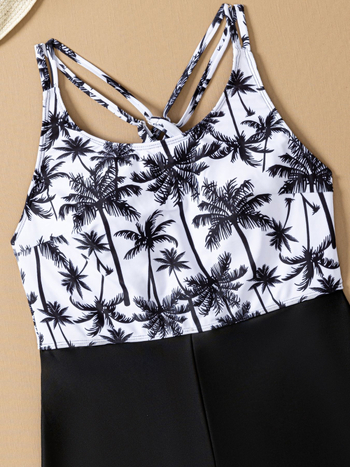 Ολόσωμο μαγιό με φλοράλ μοτίβο, ανοιχτή πλάτη, χωρίς τιράντες, με επενδεδυμένο σουτιέν χωρίς μπανέ, ύφασμα πολυεστέρα 82/18, επένδυση 95/5, κατάλληλο για κολύμβηση και θαλάσσια σπορ.