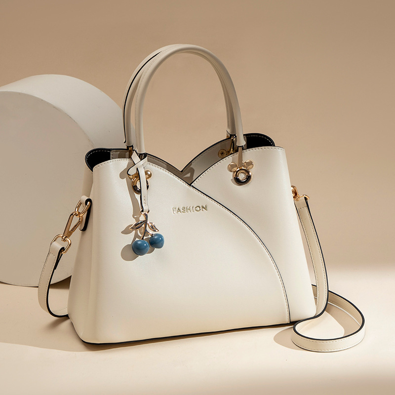 Princess Lanling valódi bőrből készült válltáska — városi egyszerűség, vízszintes négyzet alakú, csattal és cipzárral nyitható, belső zsebek sokasága