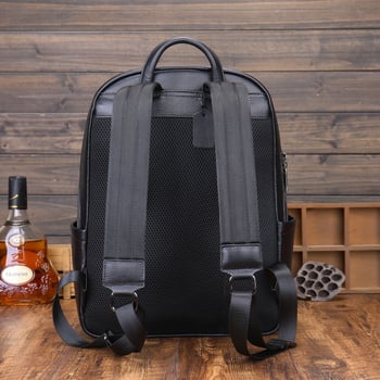 Férfi hátizsák valódi bőrből, első réteg marhabőrből, cipzáras záródás, 15 hüvelykes laptop zseb, geometriai mintázat, nylon bélés, légpárnás vállpánt