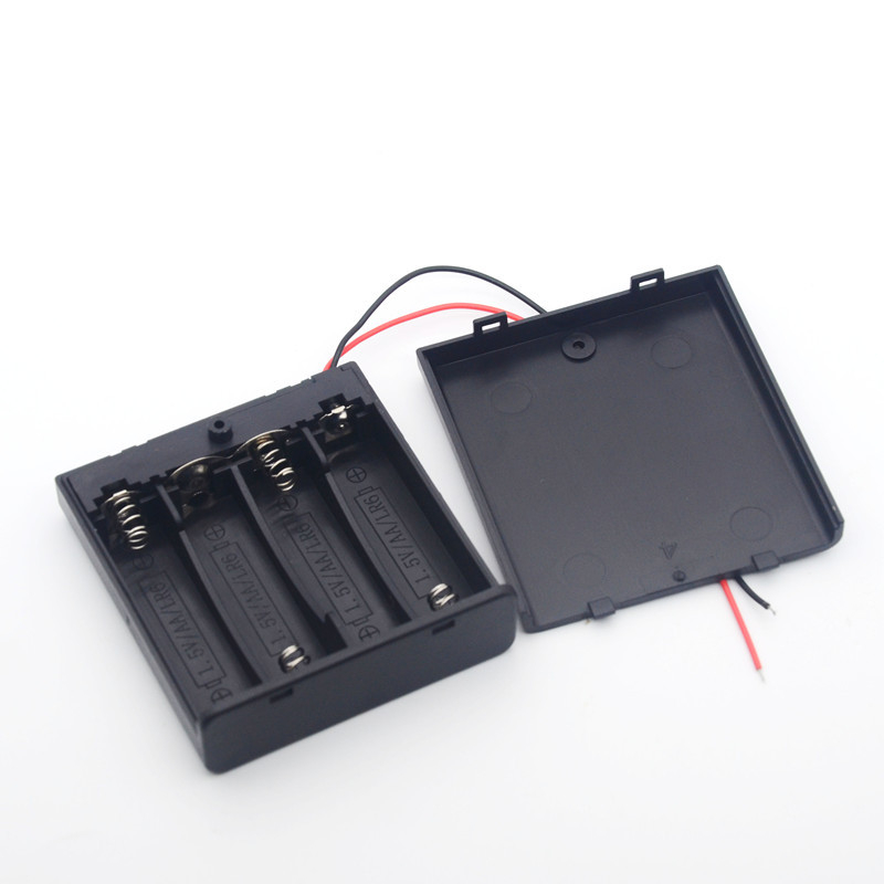 Кутия за батерии за четири AA клетки, с превключвател, капак и дебел проводник