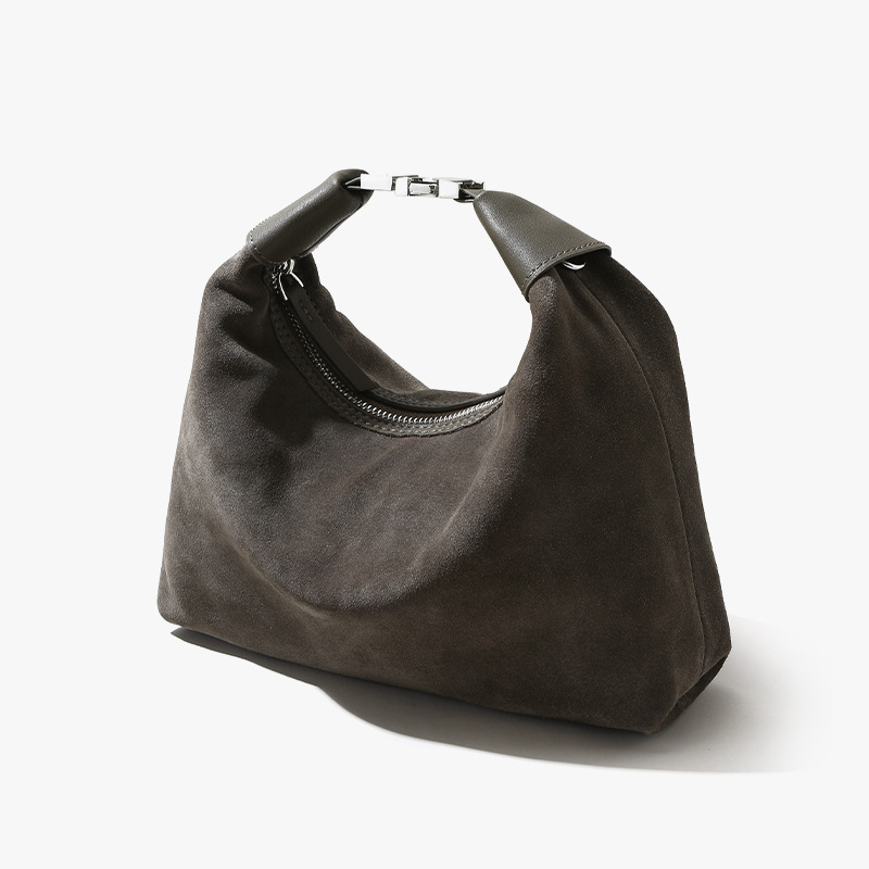 Párnás alakú táska matt marhabőrből, városi egyszerű stílus, cipzárral záródó, belső zsebek telefonhoz és személyi igazolványhoz.