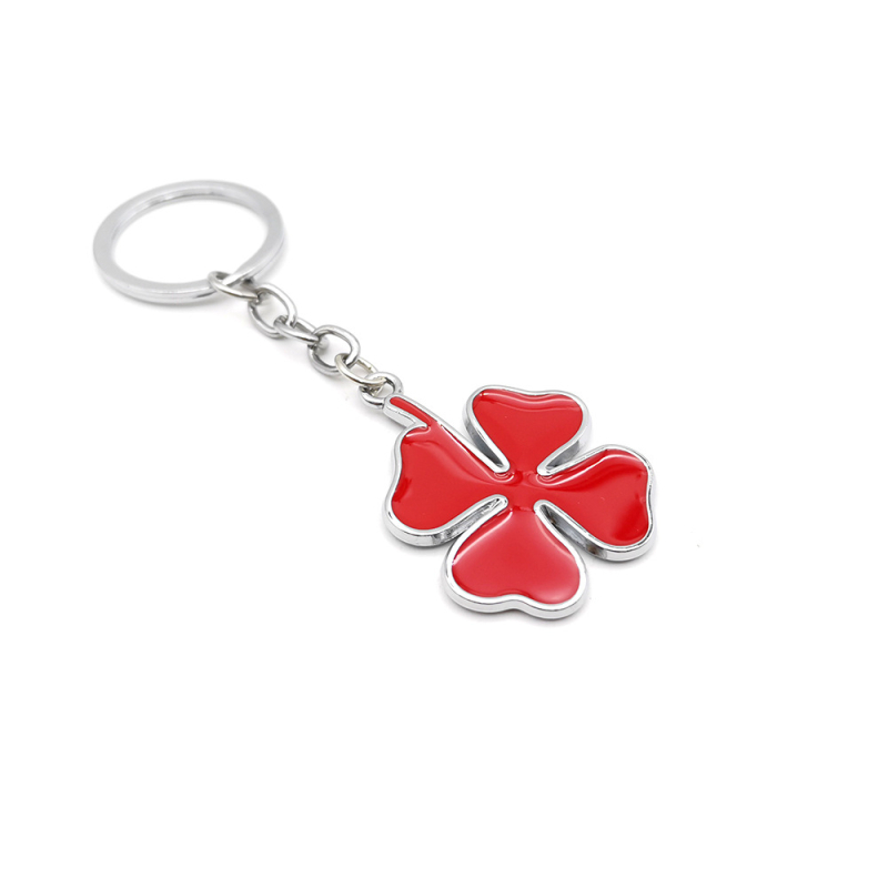 Metāla atslēgu piekariņš ar četrlapu nātres zīmējumu Alfa Romeo automašīnai, cinka sakausējums, mūsdienīgais minimālisms