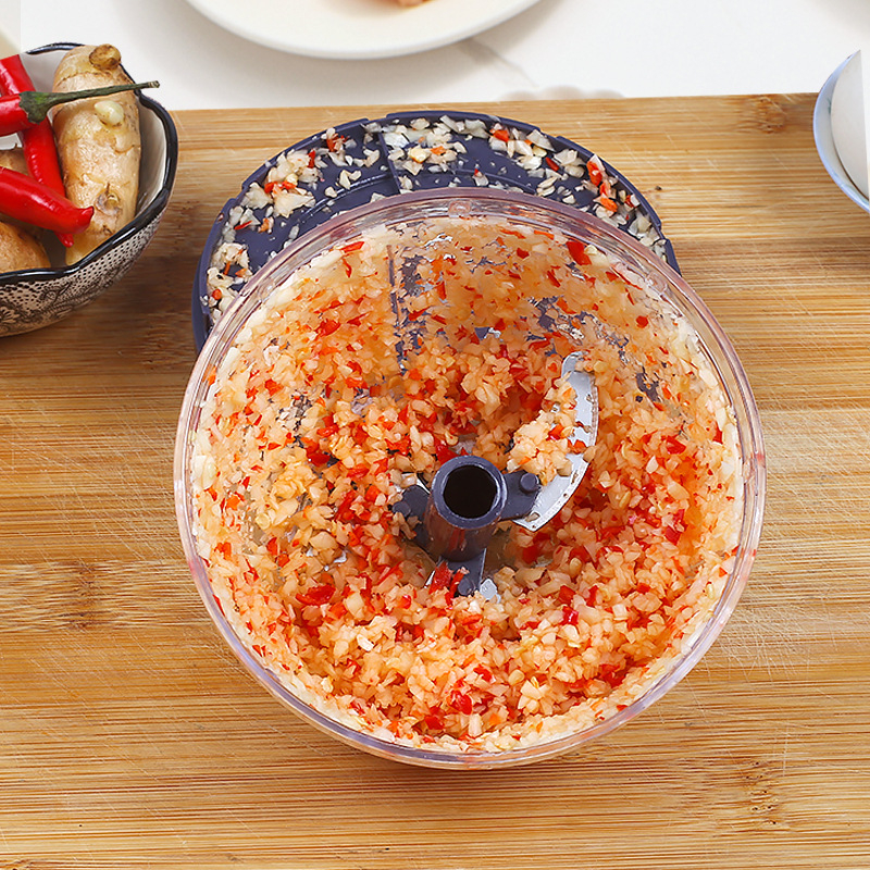 Rankinis česnako spaudimo ir malimo įrankis – plastikinis korpusas, nerūdijanio plieno peilis; daugiafunkcinis virtuvės įrankis česnakui, svogūnams, imbierui ir mėsai; prekė Home of Excellence; tinka kūdikių maistui