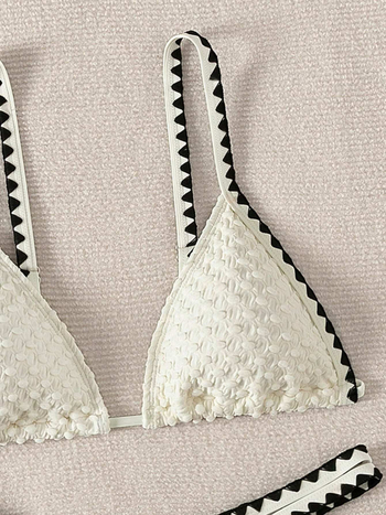 Ženski bikini kostim: poliester, bez leđa, visoka elastičnost; s jastučićima za dojke i bez čelične potpore; podstava od poliestera.