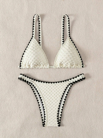 Ženski bikini kostim: poliester, bez leđa, visoka elastičnost; s jastučićima za dojke i bez čelične potpore; podstava od poliestera.