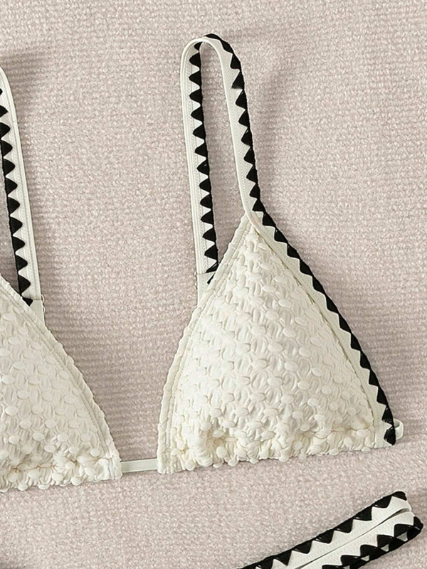 Ženski bikini kostim: poliester, bez leđa, visoka elastičnost; s jastučićima za dojke i bez čelične potpore; podstava od poliestera.
