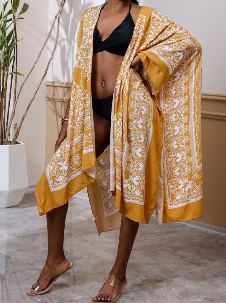 Moteriškos pliažo kardiganas su saulės apsauga ir spauda, rayon–medvilnės mišinys (80% medvilnės), poliesterio pamušalas, batwing rankovės, tinkamas plaukimo sportui