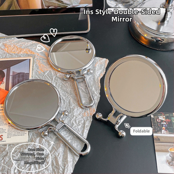 Козметично огледало, двустранно, сгъваемо, преносимо — за ръчно и настолно използване; ABS рамка, сребърно огледало.