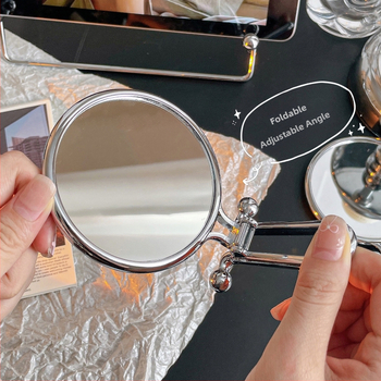 Козметично огледало, двустранно, сгъваемо, преносимо — за ръчно и настолно използване; ABS рамка, сребърно огледало.