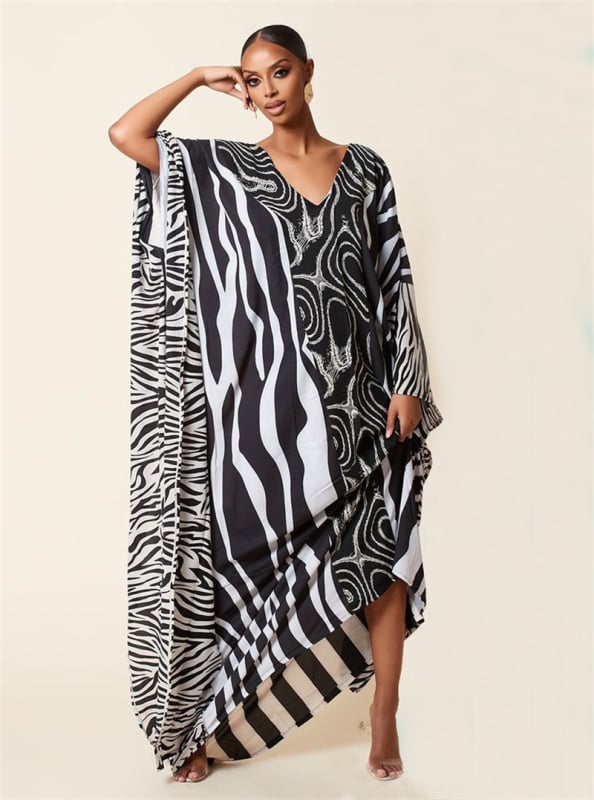 Ilga paplūdimio suknelė-cover up su geometriniu raštu, poliesteris 210 g/m², pamušalas 100% poliesteris, tinkama plaukiojimui ir brisdant vandens