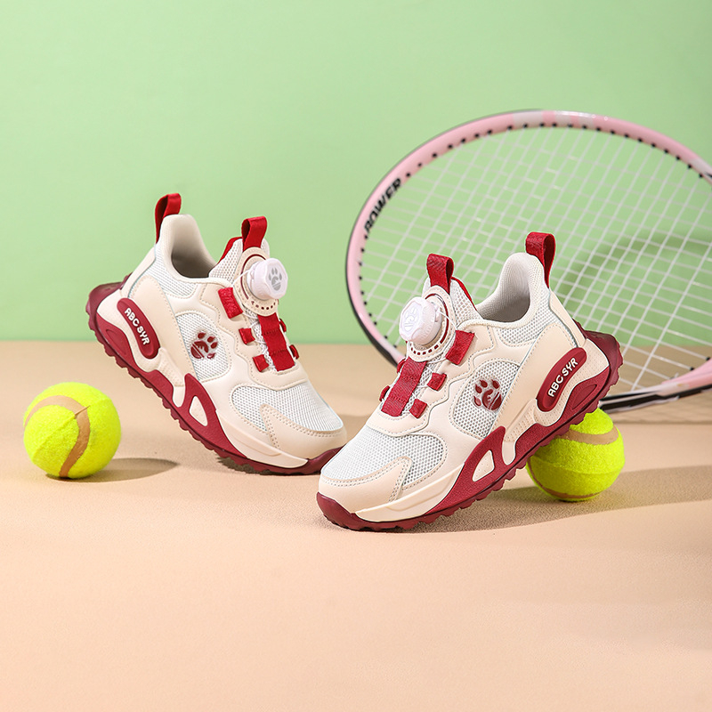 Fiúknak készült futócipő: lélegző hálós felsőrész, mesterséges bőr, EVA talp, forgó gombos zárás, könnyű és ütéscsillapító