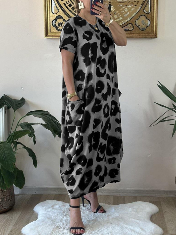 rochie cu imprimeu leopard, decolteu în V, mâneci scurte, croială midi asimetrică