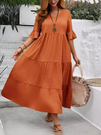 Φόρεμα με V‑λαιμό, πάνελ ραφές, μανίκια μπούφλε, μίντι μήκος, φαρδιά μέση, ύφασμα από μίξη οργανικού βαμβακιού και λίνου