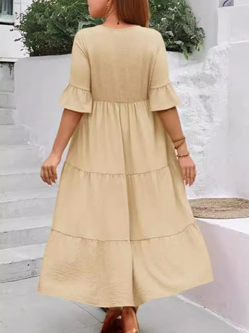 Φόρεμα με V‑λαιμό, πάνελ ραφές, μανίκια μπούφλε, μίντι μήκος, φαρδιά μέση, ύφασμα από μίξη οργανικού βαμβακιού και λίνου