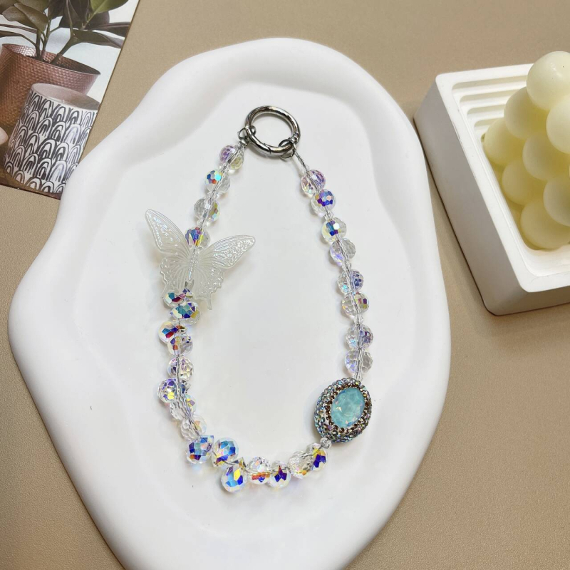 Kristályos telefonpánt gyöngyökkel és pillangó strasszal, kézzel készített, huzalos kötél és fém csat