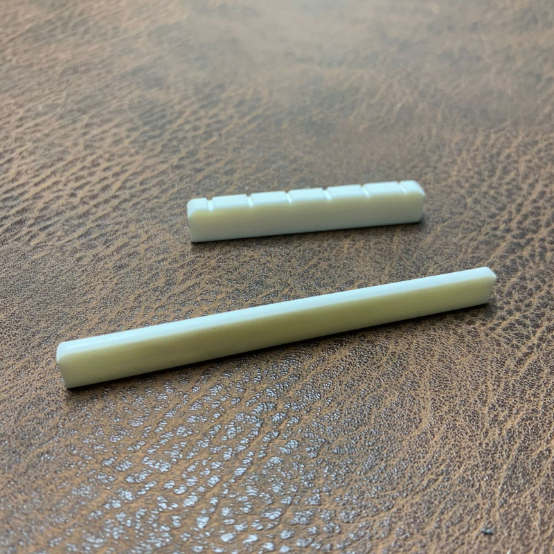 RIZO Σετ Nut και Saddle από οστό βοδιού για φολκ, κλασικές και ukulele κιθάρες – Ox bone, U-shaped, μάρκα RIZO