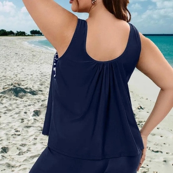 Tankini μαγιό σετ με επένδυση στο μπούστο και χωρίς μεταλλική ενίσχυση; ύφασμα πολυεστέρα (82% περιεκτικότητα σε πολυεστέρα); ριγέ ή μονόχρωμο σχέδιο; υψηλή ελαστικότητα; κατάλληλο για κολύμβηση