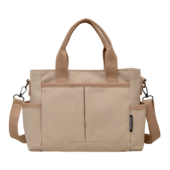 Geantă tote din pânză, cu stil urban minimalist, formă orizontală pătrată, închidere cu fermoar, buzunar pentru ID, trei curele de umăr și căptușeală poliester-bumbac.