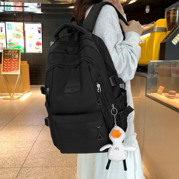 Σακίδιο πλάτης από νάιλον σε στυλ αστικού μινιμαλισμού, με καμπύλο ιμάντα ώμου, για μαθητές γυμνασίου