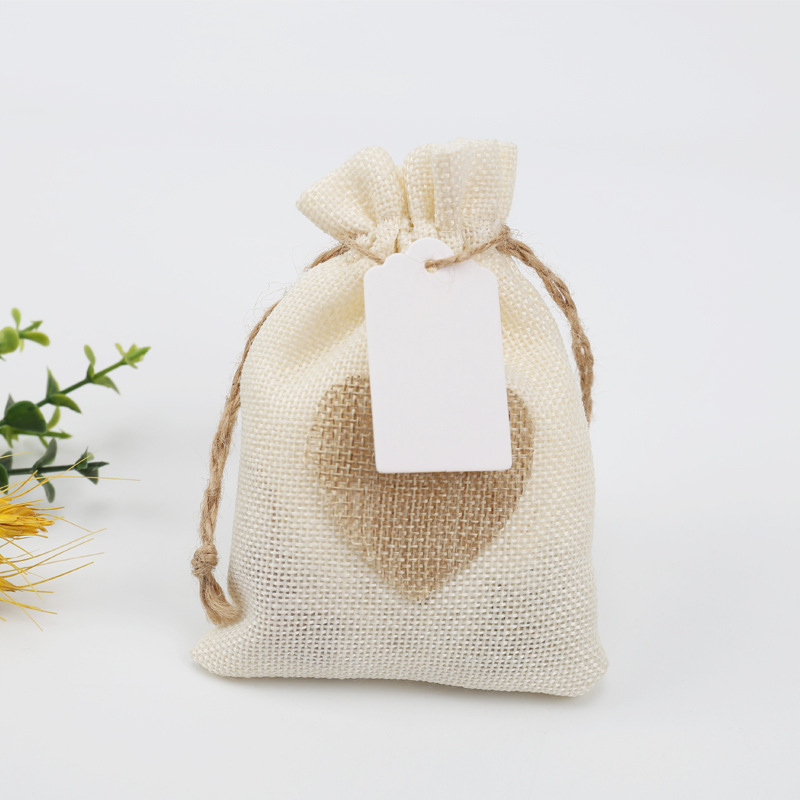 Kraft popieriaus etikečių rinkinys su 100 tuščių etikečių ir 20 m kanapių virvelių (Medžiaga: Popierius; Spausdinimas: Be spausdinimo; Turinys: 100 etikečių + 20 m virvelės)