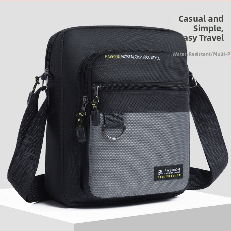 Férfi válltáska többszörös rétegű kialakítással, betűs mintázat, Oxford anyag, poliészter bélés, kopásálló (mindennapi használathoz)