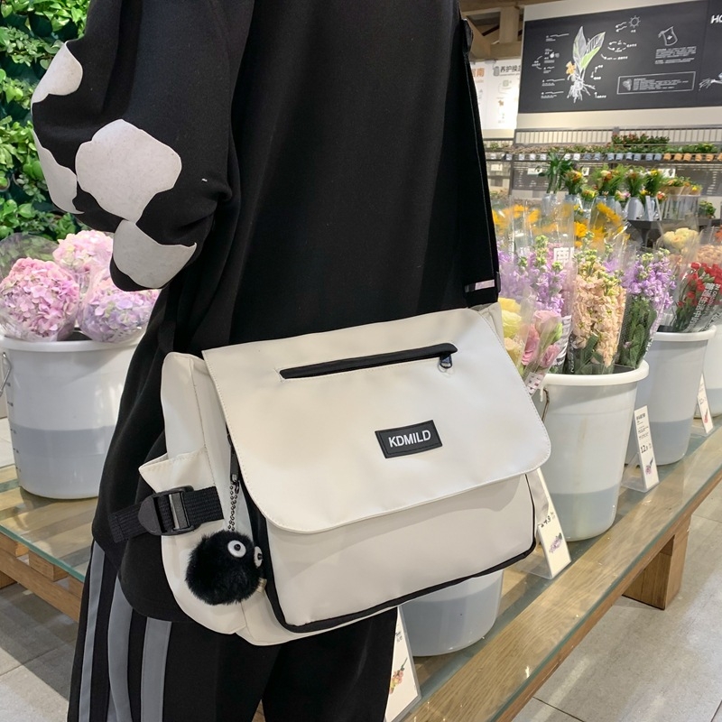Női koreai stílusú crossbody táska, Harajuku ihletésű vászon messenger, nagy kapacitású, egyszerű dizájn mindennapi használatra