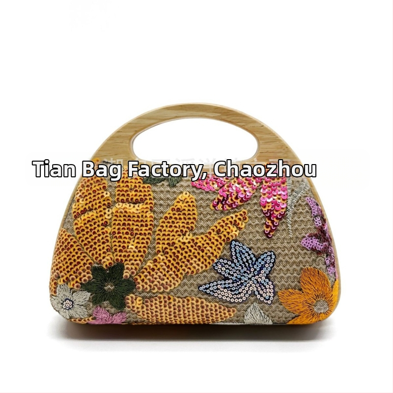 Sieviešu salmu rokassoma ar izšuvumu un pailītēm, maza horizontāla kvadrāta forma, PU oderējums, iekšējais telefona kabatiņa, atvērta augšdaļa, pavasaris 2025