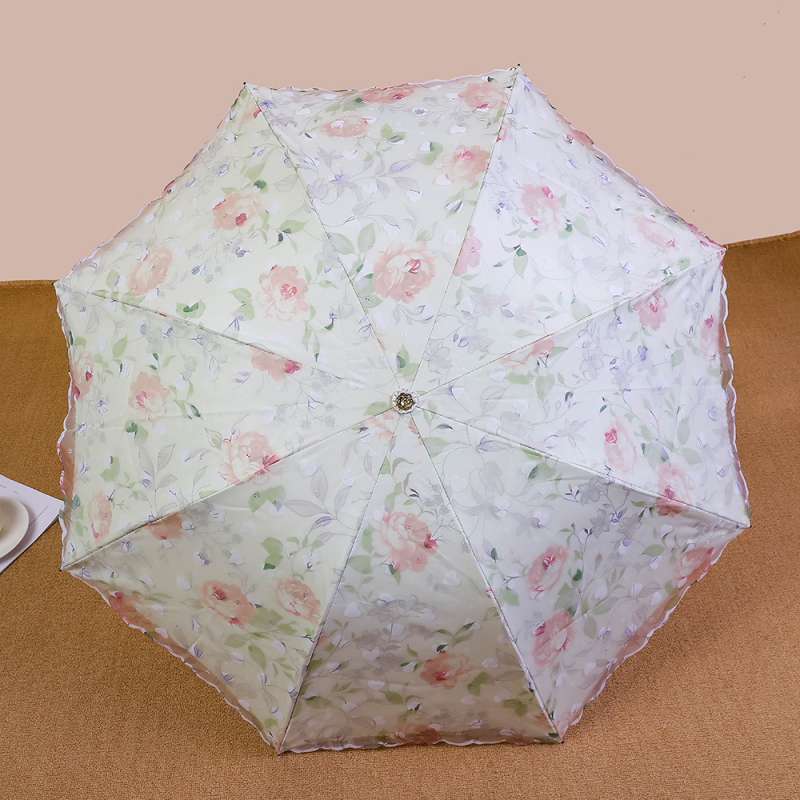 Mežģīņu audums, dubultslāņu lietussargs, 8 stieņu dzelzs rāmis, manuāla atvēršana, silikona rokturis, UV PA++ aizsardzība