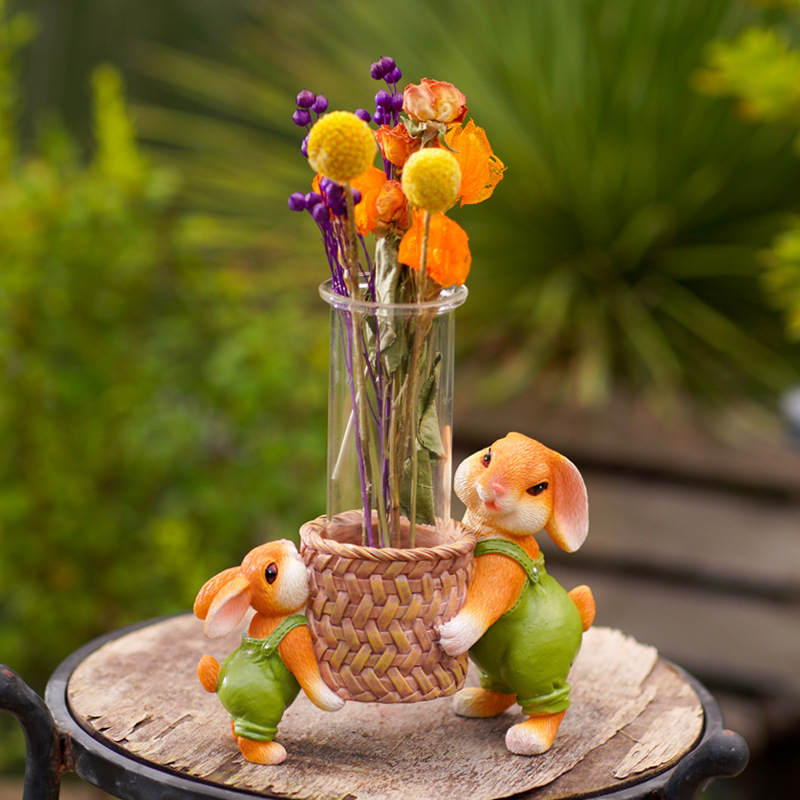 Υδροπονικό φυτό Pennywort σε γλάστρα από ρητίνη με πέτρινη βάση και γλυκιά λευκή πάπια διακοσμητικό για κήπο και τραπεζάκι τσαγιού