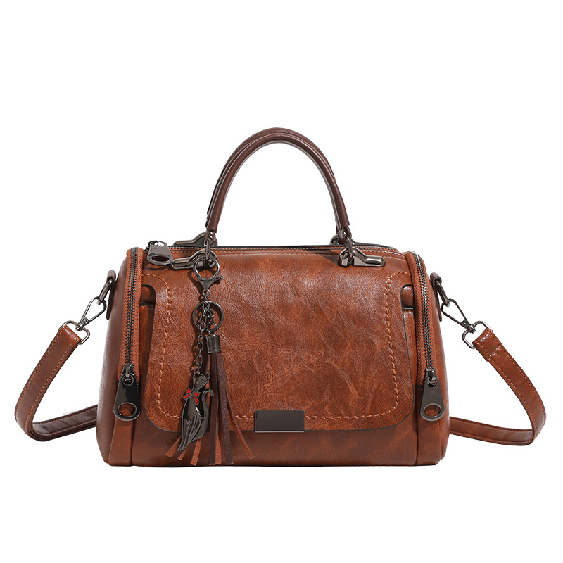 Torba za rame Boston stila, PU materijal, otvaranje na zip, ovalni oblik, unutarnji džepovi za telefon i identifikacijsku karticu