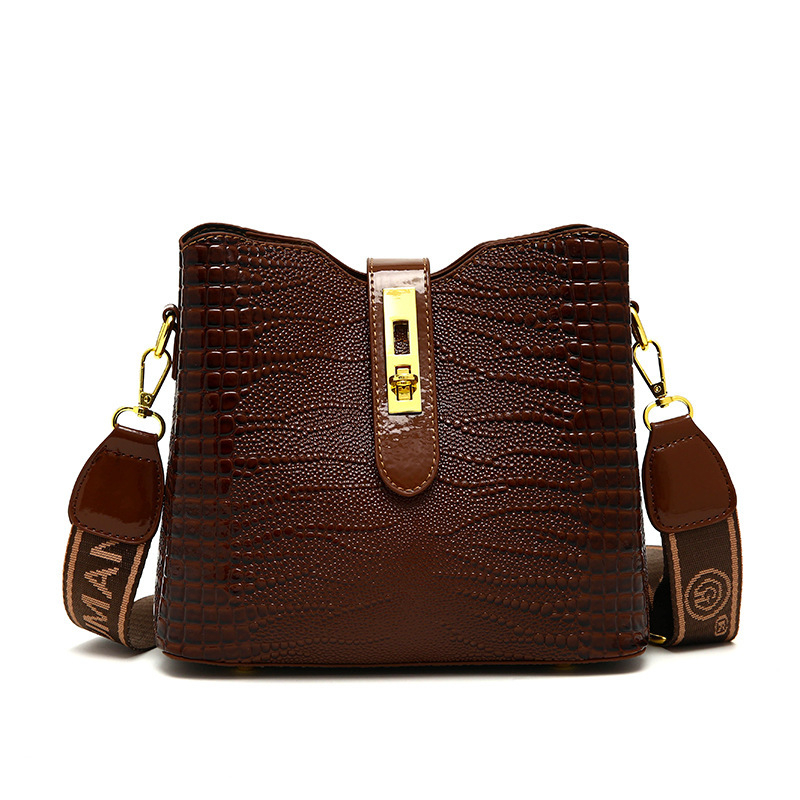 Bucket torba od PU kože, zatvaranje kapom, unutarnji džepovi: zip, džep za telefon i ID