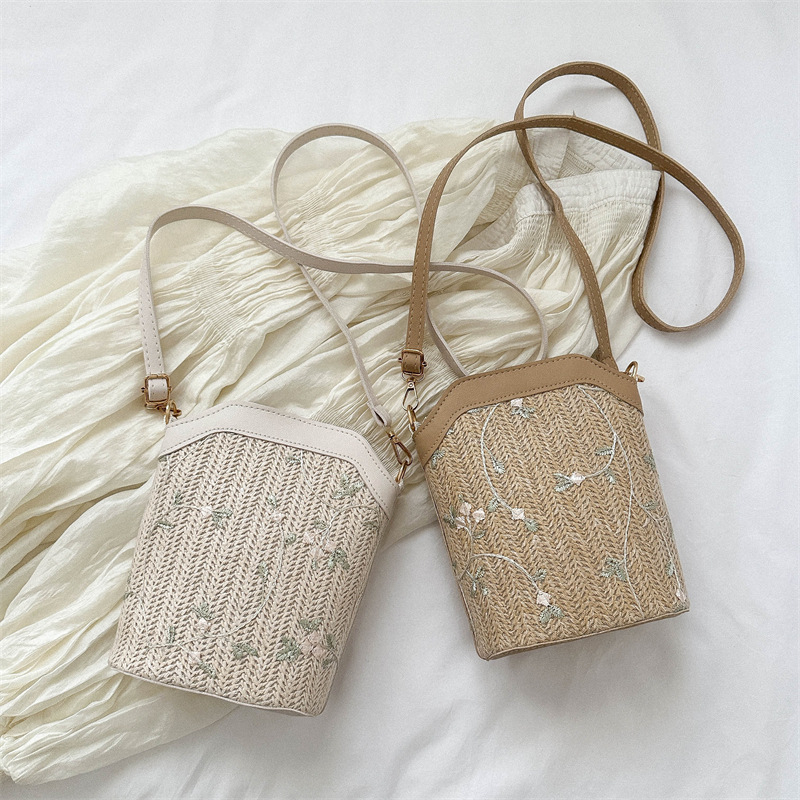Bucket bag with rope braid material, zipper opening, bucket silhouette, internal cellphone pocket, inner patch pocket
