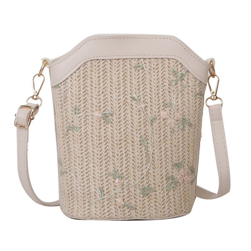 Bucket bag with rope braid material, zipper opening, bucket silhouette, internal cellphone pocket, inner patch pocket