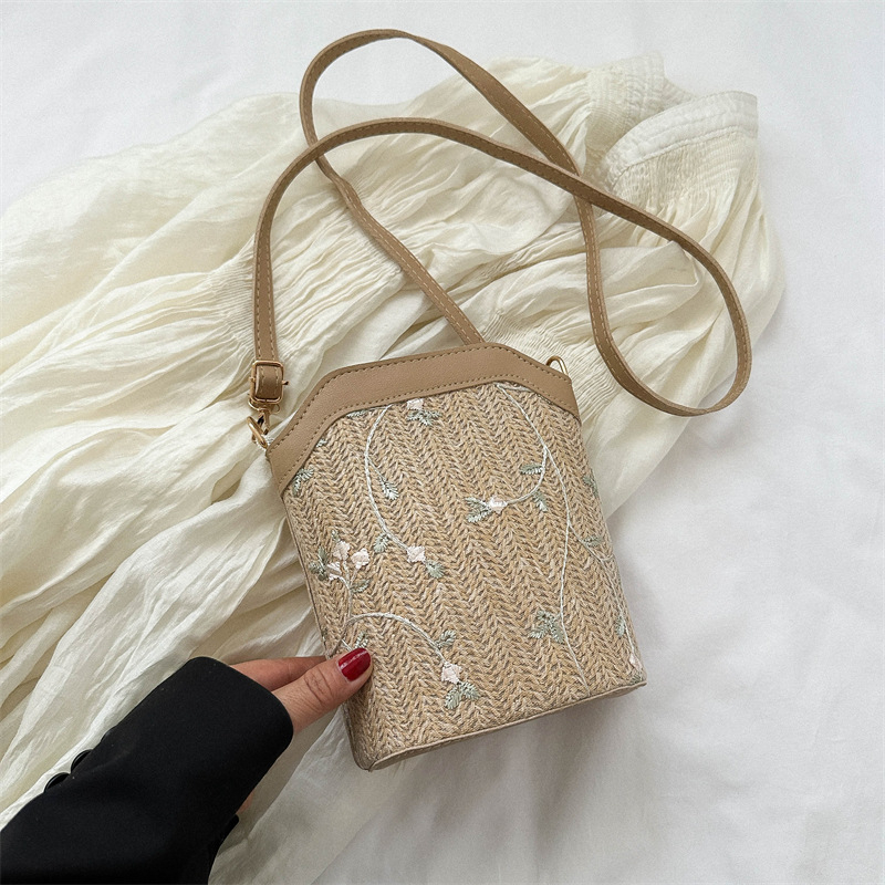 Bucket bag with rope braid material, zipper opening, bucket silhouette, internal cellphone pocket, inner patch pocket