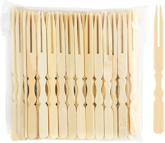 Vienkartinė bambukinė vaisių šakutė su šiuolaikiniu minimalistiniu dizainu, skirta suaugusiems, pirmosios klasės kokybė.