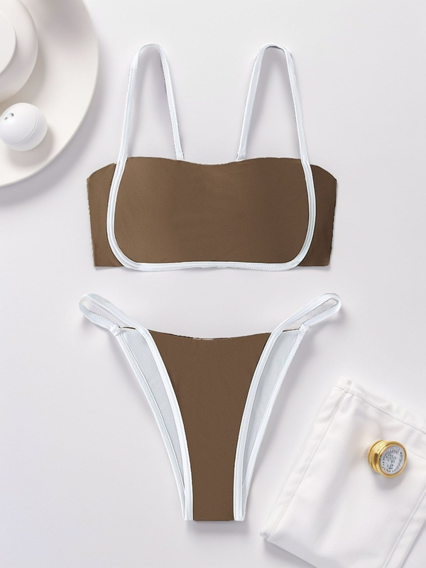 Két részes női bikinifürdőruha párnázott felsővel, egyszínű nejlon anyagból, 82% nejlon, tömege 250 g, alkalmas úszásra és sekély vízben való sétára.