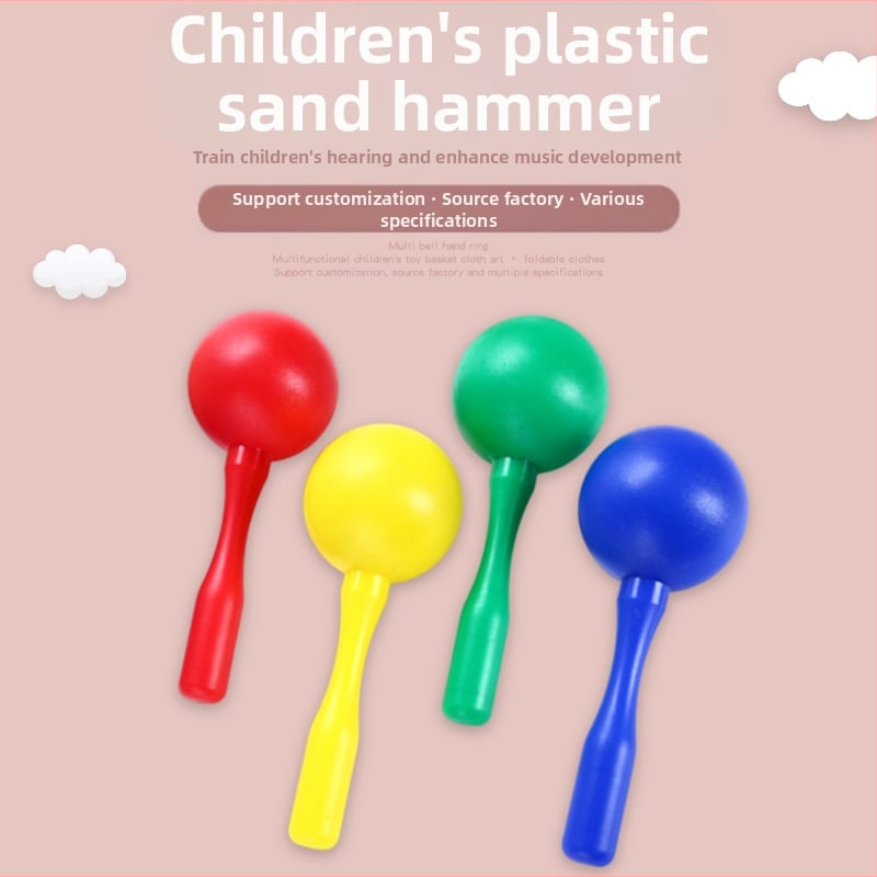 Bērnu plastmasas smilšu āmurs – ovāls perkusijas instruments ausu un sensoriskai attīstībai; materiāls: plastmasa; vecums 15–35 gadi