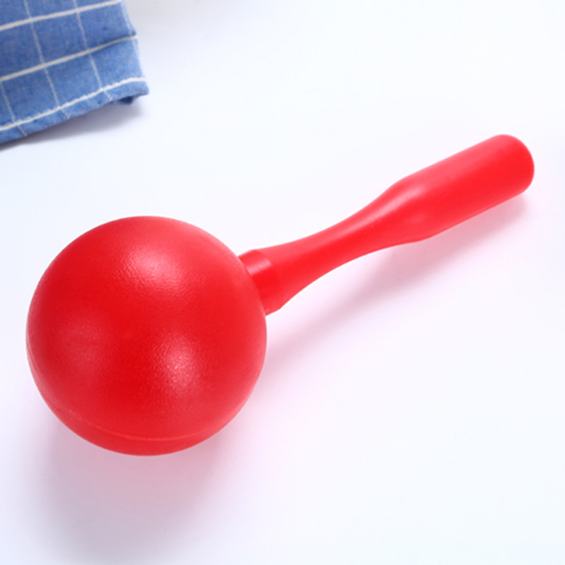 Bērnu plastmasas smilšu āmurs – ovāls perkusijas instruments ausu un sensoriskai attīstībai; materiāls: plastmasa; vecums 15–35 gadi