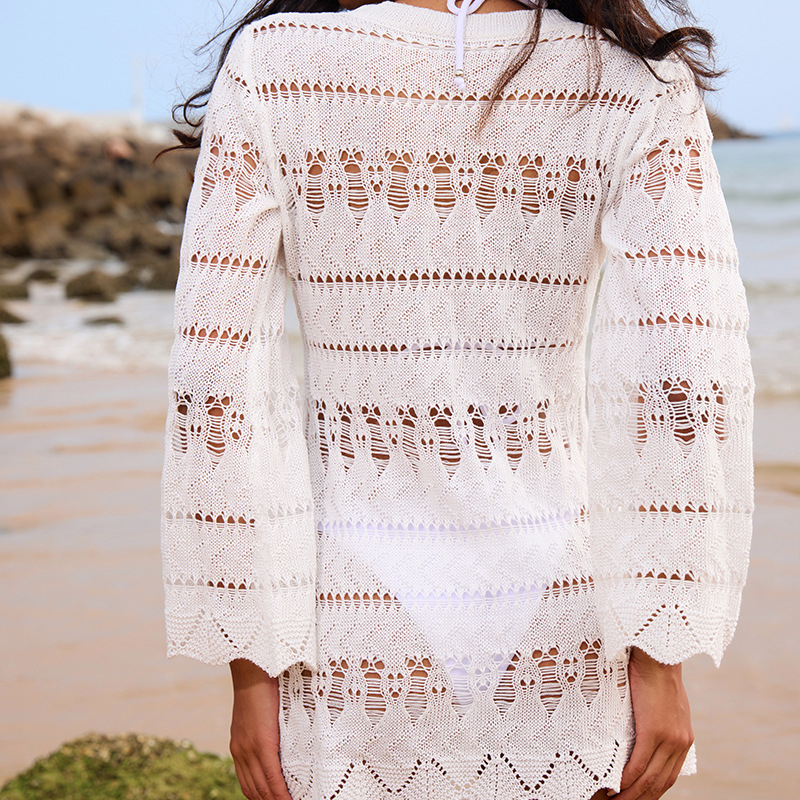 Σετ παραλίας δύο τεμαχίων: φαρδιά μπλούζα με στρογγυλό λαιμό και μανίκια καμπάνα, διάτρητη υφή; Υφάσματα: πολυεστέρας; Επένδυση: πολυεστέρας; Βάρος: 248 g