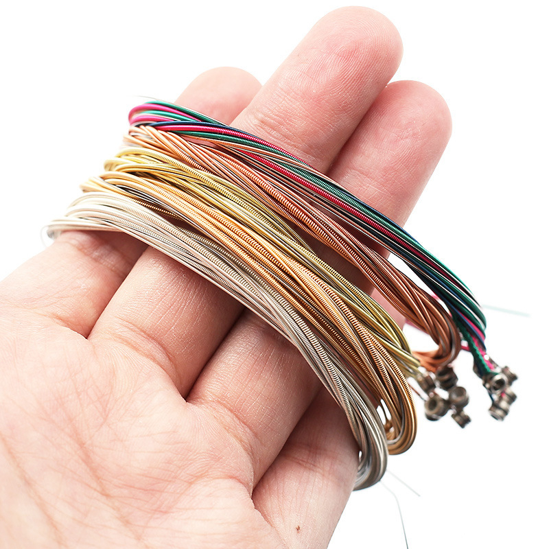 Madina corzi pentru chitară folk – modele AG01/AG20/AG25/AC28; materiale: cupru roșu, cupru, cupru cu fosfor, acoperire argintie; ambalare: în pungă