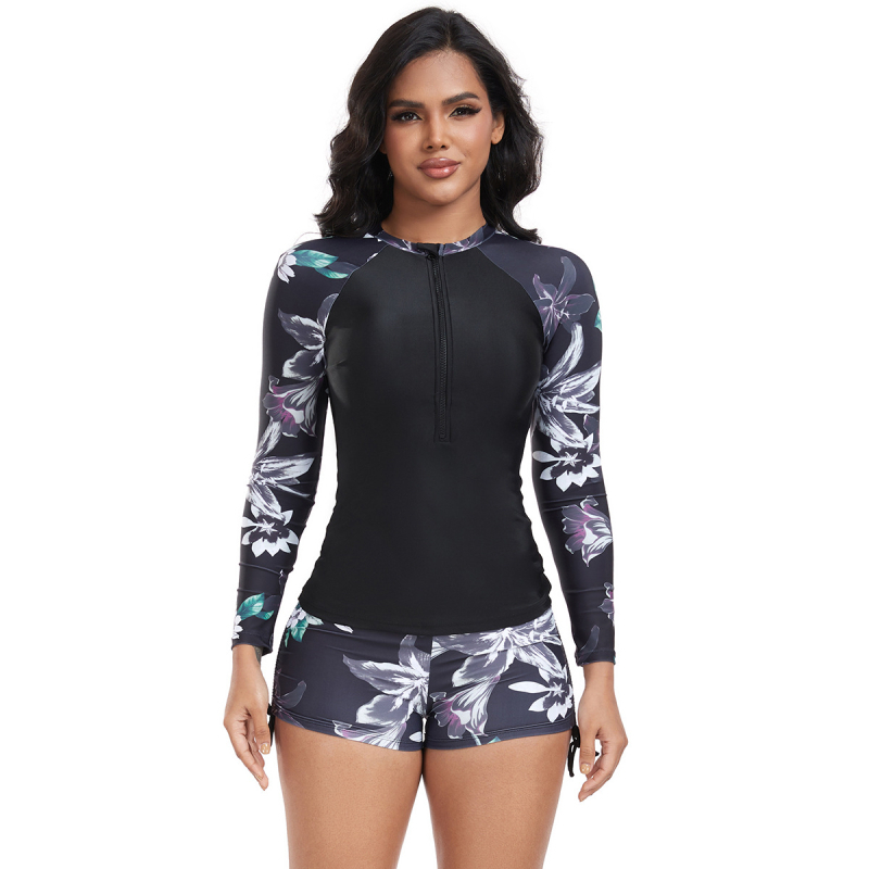 Costum de baie damă cu mâneci lungi pentru surfing – model split, imprimeu floral, elasticitate înaltă, cupe cu bureți, poliester 82% + căptușeală spandex 90%, greutate 400 g