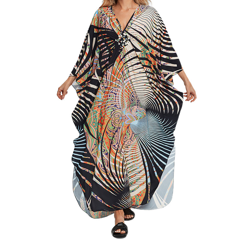 Tengerparti ruha: rayon anyag, nyomtatott minta, V-nyak, rövid ujjú, A-vonalú sziluett