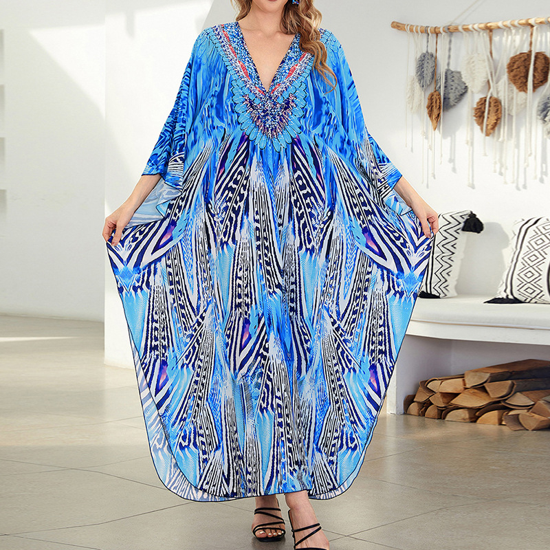 Tengerparti ruha: rayon anyag, nyomtatott minta, V-nyak, rövid ujjú, A-vonalú sziluett