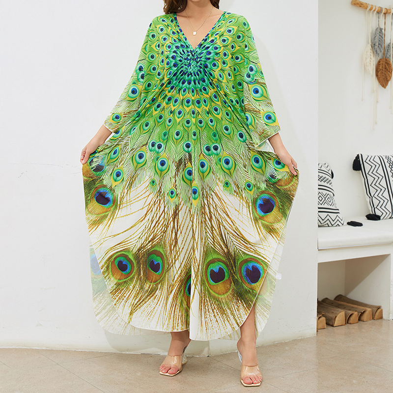 Tengerparti ruha: rayon anyag, nyomtatott minta, V-nyak, rövid ujjú, A-vonalú sziluett