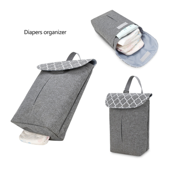 Pelenkák tárolására szolgáló táska – kézitáska formájú, poliészter anyag, többfunkciós, utazáshoz