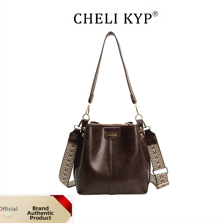 Taška bucket v štýle Koreje, PU materiál, horizontálny štvorcový tvar, otvorenie s krytom, vnútorná kapsa so zipsom typu sendvič, dvojité ramenné popruhy